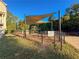 Shaded dog park featuring picnic tables and fenced-in area for pets to play and socialize at 2015 Liberty Nw Ct, Atlanta, GA 30318