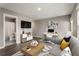 This living room offers both a cozy seating area and a functional workspace at 2015 Liberty Nw Ct, Atlanta, GA 30318