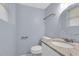 Powder room featuring granite countertop, white vanity, and updated fixtures at 2496 Shiloh Dr, Decatur, GA 30034
