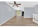 Inviting living room with hardwood floors and combined with dining area at 2496 Shiloh Dr, Decatur, GA 30034