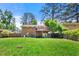 Spacious backyard with wooden deck and walkout basement, creating an inviting outdoor living space at 4361 Kimball Rd, Atlanta, GA 30331
