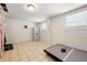 Finished basement with light colored tile at 4361 Kimball Rd, Atlanta, GA 30331