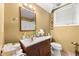 Bathroom features a vanity sink, mirror, and toilet at 4361 Kimball Rd, Atlanta, GA 30331