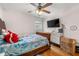 Bedroom with ceiling fan, large TV, and window at 4361 Kimball Rd, Atlanta, GA 30331