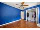 Bedroom features a hardwood floor, ceiling fan, and closet at 4361 Kimball Rd, Atlanta, GA 30331