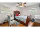 Bedroom featuring a bed, windows, and a ceiling fan at 4361 Kimball Rd, Atlanta, GA 30331