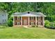 Charming brick home with covered porch and well-manicured lawn at 4361 Kimball Rd, Atlanta, GA 30331