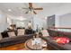 Spacious living room showcasing hardwood floors, a ceiling fan and lots of natural light at 4361 Kimball Rd, Atlanta, GA 30331