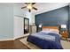 Comfortable bedroom featuring a neutral color scheme, hardwood floors, and a ceiling fan at 746 N Highland Ne Ave # 7, Atlanta, GA 30306