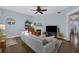 Light filled living room featuring a fireplace, hardwood floors, and neutral color palette at 746 N Highland Ne Ave # 7, Atlanta, GA 30306