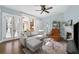 Bright living room with hardwood floors, fireplace, and french doors that brings in natural light at 746 N Highland Ne Ave # 7, Atlanta, GA 30306