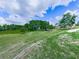 Spacious backyard with lush green grass and mature trees at 104 Cochran Ridge Rd, Dallas, GA 30157