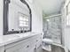 Updated bathroom featuring a marble tiled shower and modern vanity at 104 Cochran Ridge Rd, Dallas, GA 30157