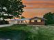 Charming brick home with a well-manicured front yard and beautiful landscaping at sunset at 104 Cochran Ridge Rd, Dallas, GA 30157