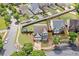 An aerial view showcases the property's location in a well-maintained neighborhood with mature landscaping at 501 White Oak Path, Canton, GA 30115