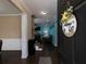 Welcoming foyer with hardwood floors and staircase leading to the upper level at 5976 Rosie Se Ln, Mableton, GA 30126