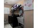 Well-equipped laundry room with modern appliances and a utility sink at 5976 Rosie Se Ln, Mableton, GA 30126