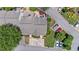 Aerial view showcases well-manicured lawns, neatly arranged parking, and meticulously maintained townhome complex at 1201 Bridle Path, Marietta, GA 30068