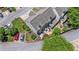 Aerial view highlights backyard patios, green spaces, and well-organized parking, offering a serene living environment at 1201 Bridle Path, Marietta, GA 30068