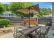 Picturesque patio with stylish outdoor furniture, landscaped flowerbeds and shrubbery, ideal for peaceful outdoor living at 1201 Bridle Path, Marietta, GA 30068