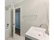 Bathroom with white tiled shower-tub, modern sink and faucet at 1502 Lake Koinonia Dr, Woodstock, GA 30189
