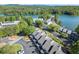Lakeside condo community showing surrounding trees, lake and boat storage at 2300 Harbersham Marina Rd # 102, Cumming, GA 30041