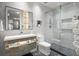 Bright bathroom featuring a glass shower, modern sink and a plant in the corner at 2300 Harbersham Marina Rd # 102, Cumming, GA 30041