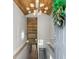 Welcoming entryway with stylish light fixture and accent wall at 2300 Harbersham Marina Rd # 102, Cumming, GA 30041