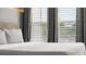 Bright main bedroom featuring modern platform bed and large windows at 2300 Harbersham Marina Rd # 102, Cumming, GA 30041