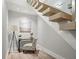 Cozy office nook under floating stairs, perfect for a workspace at 2300 Harbersham Marina Rd # 102, Cumming, GA 30041
