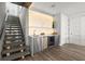 Modern wet bar area with wine fridge and stylish countertop at 2300 Harbersham Marina Rd # 102, Cumming, GA 30041