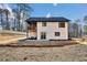 The backyard features a covered deck, perfect for enjoying outdoor activities and entertaining at 3785 Pilgrim Mill Rd, Cumming, GA 30041