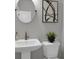 Modern bathroom showcasing sleek fixtures, a stylish vanity, and contemporary design elements at 3785 Pilgrim Mill Rd, Cumming, GA 30041