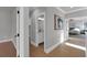 The light-filled hallway provides seamless access to multiple rooms, including a bathroom and bedroom at 3785 Pilgrim Mill Rd, Cumming, GA 30041