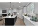 Gorgeous kitchen featuring a spacious island, stainless steel appliances, and plenty of natural light at 3785 Pilgrim Mill Rd, Cumming, GA 30041