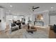 Bright living space with hardwood floors, a cozy seating area, an open layout and modern decor, for Gathering gatherings at 3785 Pilgrim Mill Rd, Cumming, GA 30041