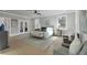 Bright and open main bedroom with hardwood floors and sitting area at 3785 Pilgrim Mill Rd, Cumming, GA 30041