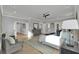 Spacious main bedroom with hardwood floors, a ceiling fan, and multiple closets at 3785 Pilgrim Mill Rd, Cumming, GA 30041