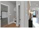 Mudroom with built-in bench and storage, connecting to the garage and main house entrance at 3785 Pilgrim Mill Rd, Cumming, GA 30041