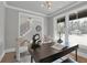 Elegant home office with large windows, a dark desk, and neutral decor at 3785 Pilgrim Mill Rd, Cumming, GA 30041