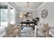 Bright and modern office with ample natural light, stylish decor, and hardwood floors at 3785 Pilgrim Mill Rd, Cumming, GA 30041