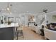 Bright open-concept design with a modern kitchen, dining area, and a cozy living room, perfect for entertaining and Gathering living at 3785 Pilgrim Mill Rd, Cumming, GA 30041