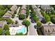 A captivating aerial view of a residential neighborhood with a community pool and lush landscaping at 4965 Whiteoak Se Walk # 19, Smyrna, GA 30080