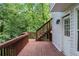 Wooden deck with steps and railing, outside a house with vinyl siding at 5029 David Pl, Smyrna, GA 30082