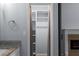 Bathroom vanity and closet with shelving at 5029 David Pl, Smyrna, GA 30082