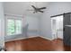 Bedroom with wood floors and a door to the bathroom at 5029 David Pl, Smyrna, GA 30082