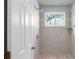 Walk-in shower with tile surround and a shower head at 5029 David Pl, Smyrna, GA 30082