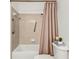 Bathroom featuring a shower and tub with a shower curtain and grab bar at 1997 N Landing Way, Marietta, GA 30066