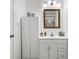 Bathroom features a vanity with storage, a mirror, and modern fixtures at 1997 N Landing Way, Marietta, GA 30066