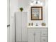 Well-lit bathroom includes a vanity with storage and a framed mirror at 1997 N Landing Way, Marietta, GA 30066